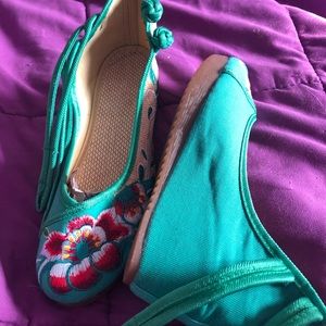 Green embroidered shoes